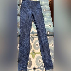Lululemon blue and black galaxy print leggings.